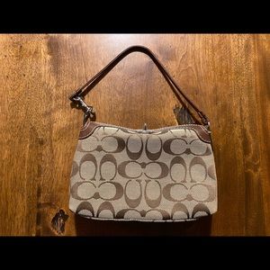 Coach wristlet- brown signature.